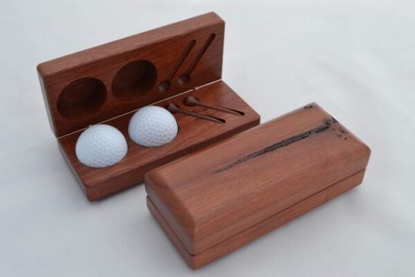 Golf Ball Box with balls and tees.
